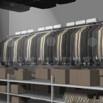 Wall mounted automated lift garment racks