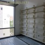 Wall mounted shelving without stanchions books library stacks