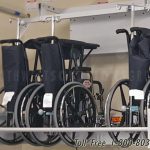 Wheelchair lift storage hospital wall lift rack