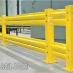 Yellow machine guard railing