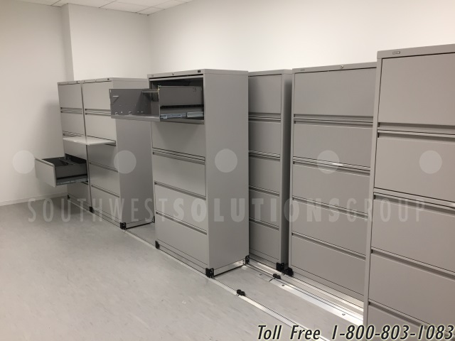 https://www.southwestsolutions.com/wp-content/uploads/2021/08/office-sliding-storage-cabinets.jpg