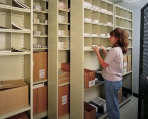 2 double triple deep slider file shelving moves on tracks to save storage space