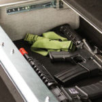 Law enforcement trunk gun storage