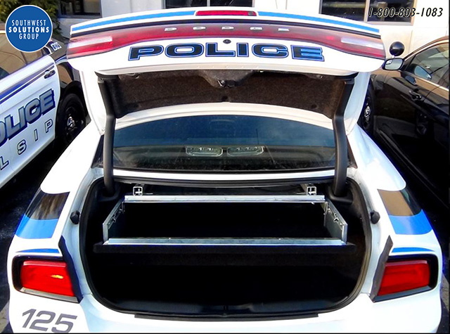 Police trunk storage for guns