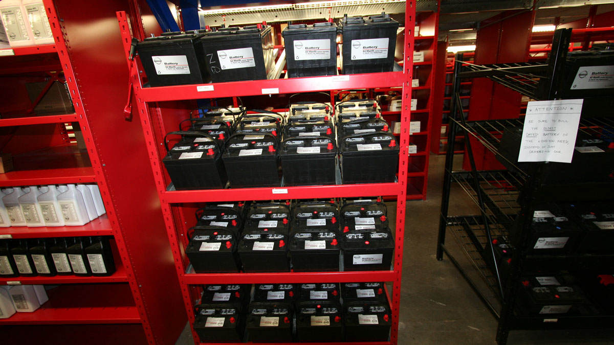 storing automotive batteries demonstrating proper battery shelving for safe storage in parts departments