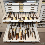 historic weapons museum drawer cabinets