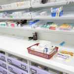 rx pharmacy shelving over counter sloped