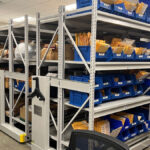 Space-saving rack storage system designed for compact commercial or office environments