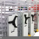 mechanical assist compact shelving