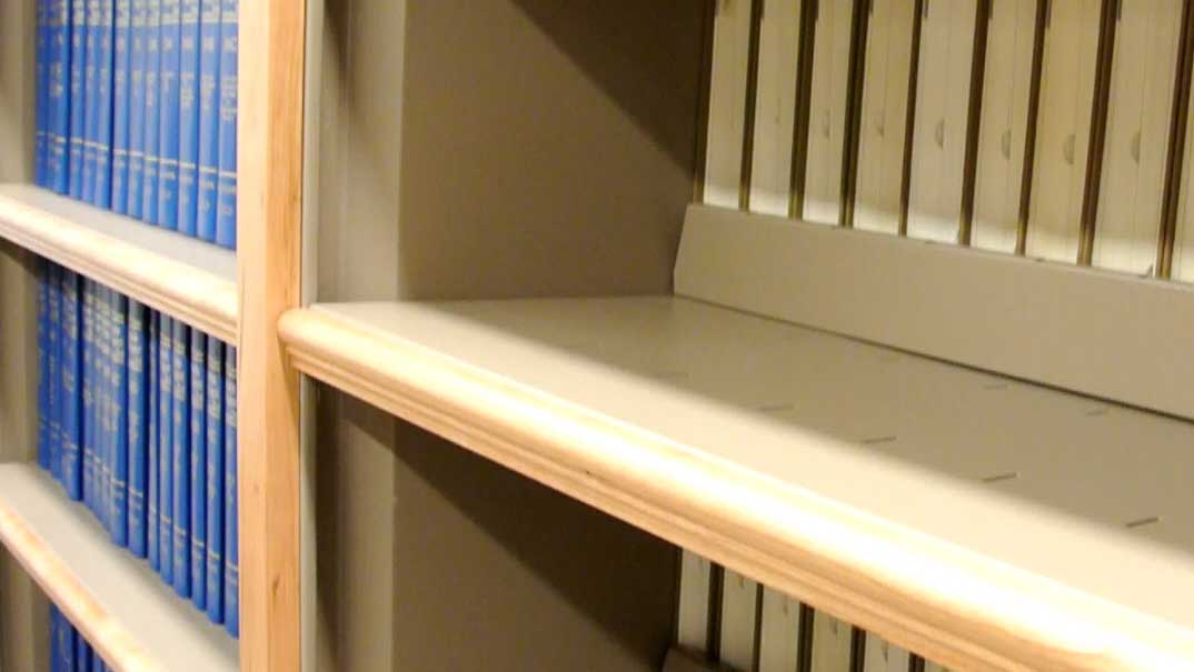 metal shelving with wood trim featured