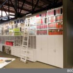 library shelves with rolling ladders