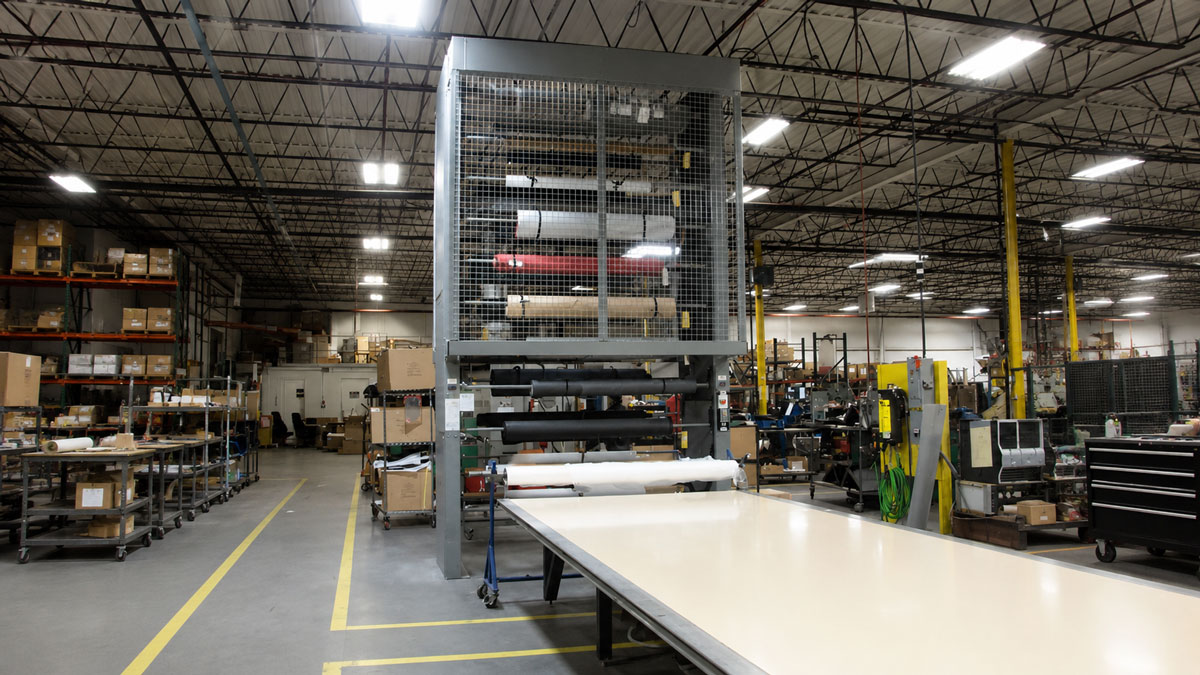 rug carousel warehouse storage system for organized rolled material storage