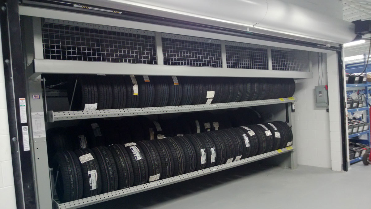 tire carousel storage rack for organized automotive tire storage in service areas