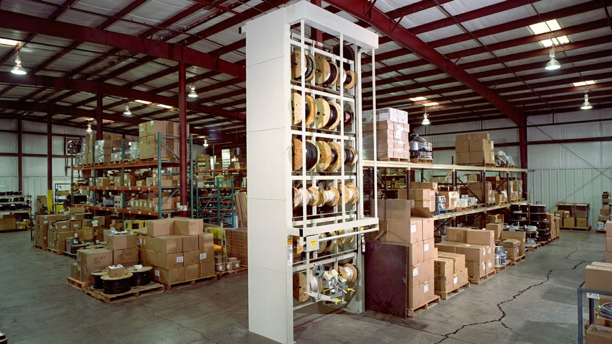 wire spool carousel warehouse inventory rack for organized cable reel storage