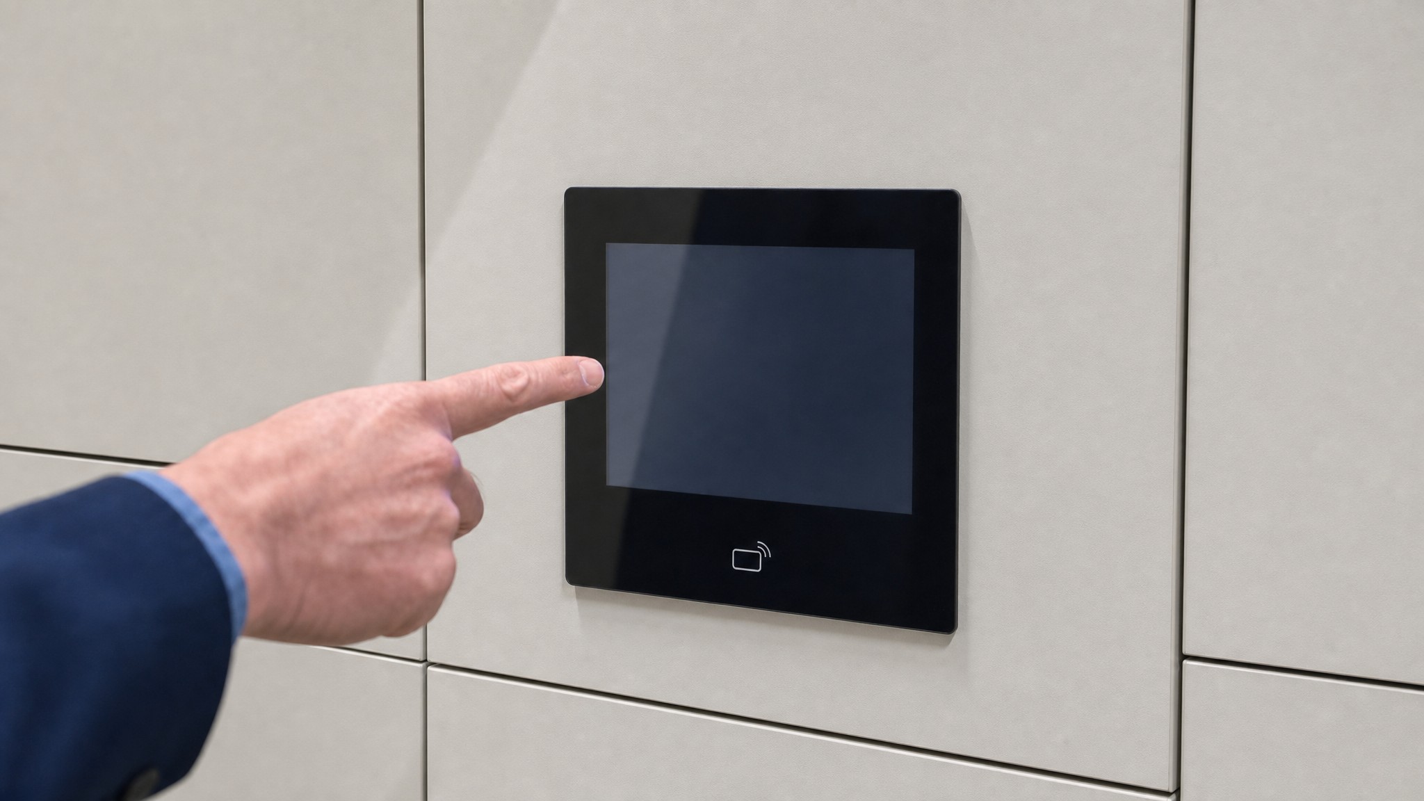 Hand pointing to touchscreen interface on employee locker door